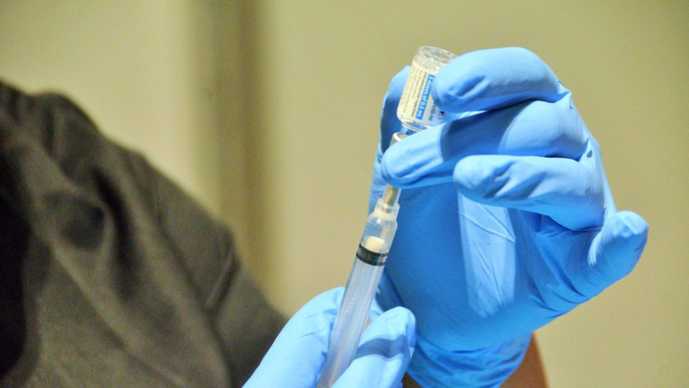 Photo of a nurse preparing a Johnson & Johnson vaccine