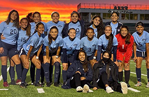 Team photo of the Women's Soccer team taken in Kansas