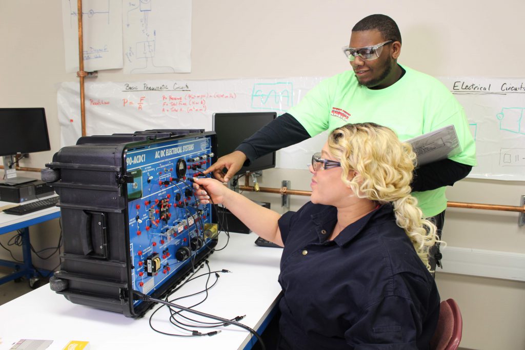 two students in manufacturing lab