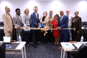 A featured photo of dedication of a conference room at Oak Forest Campus